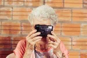 Older woman with camera