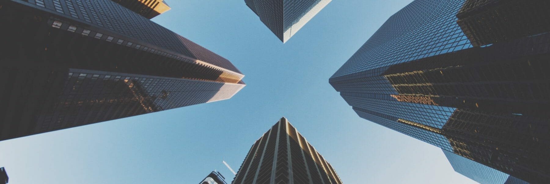 a worm's eye view of corporate high rises in Calgary, AB