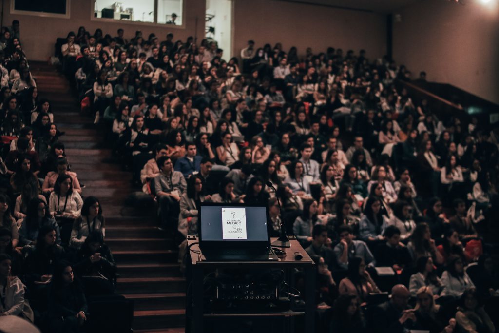 a packed lecture hall of students