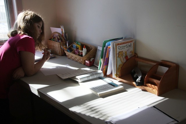 A homeschooling student gets to work.