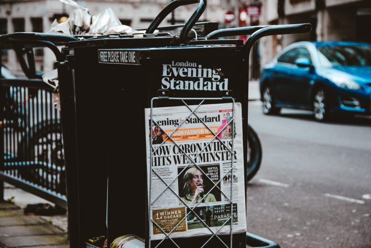 An image of the U.K.'s Evening Standard paper stand bearing a headline about coronavirus.