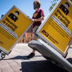 ASU workers roll out ppe and signage on campus