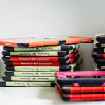 A stack of tablets used by students