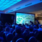 An organization conducts a training event with multimedia.