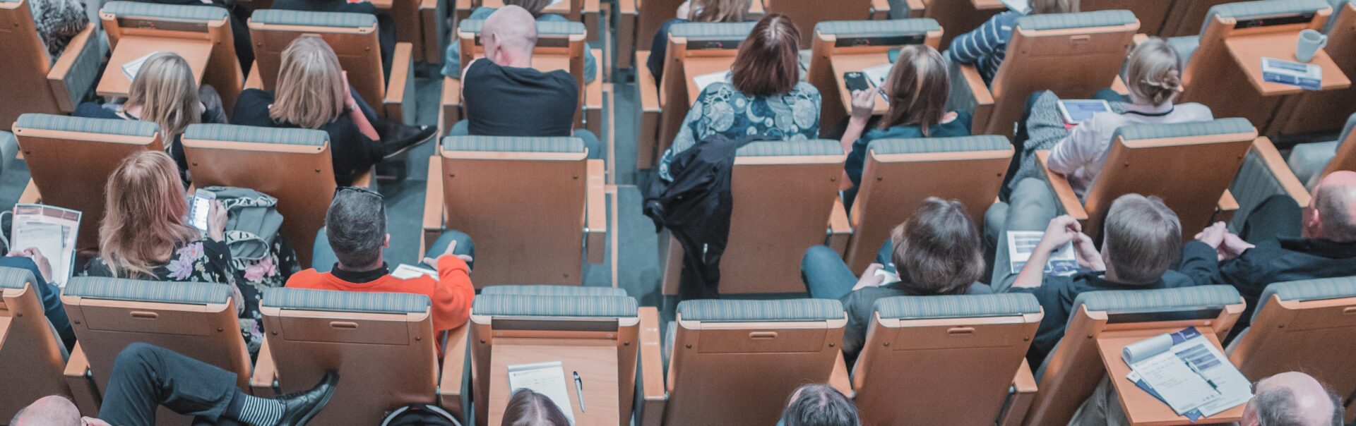 Group of people sitting in chairs