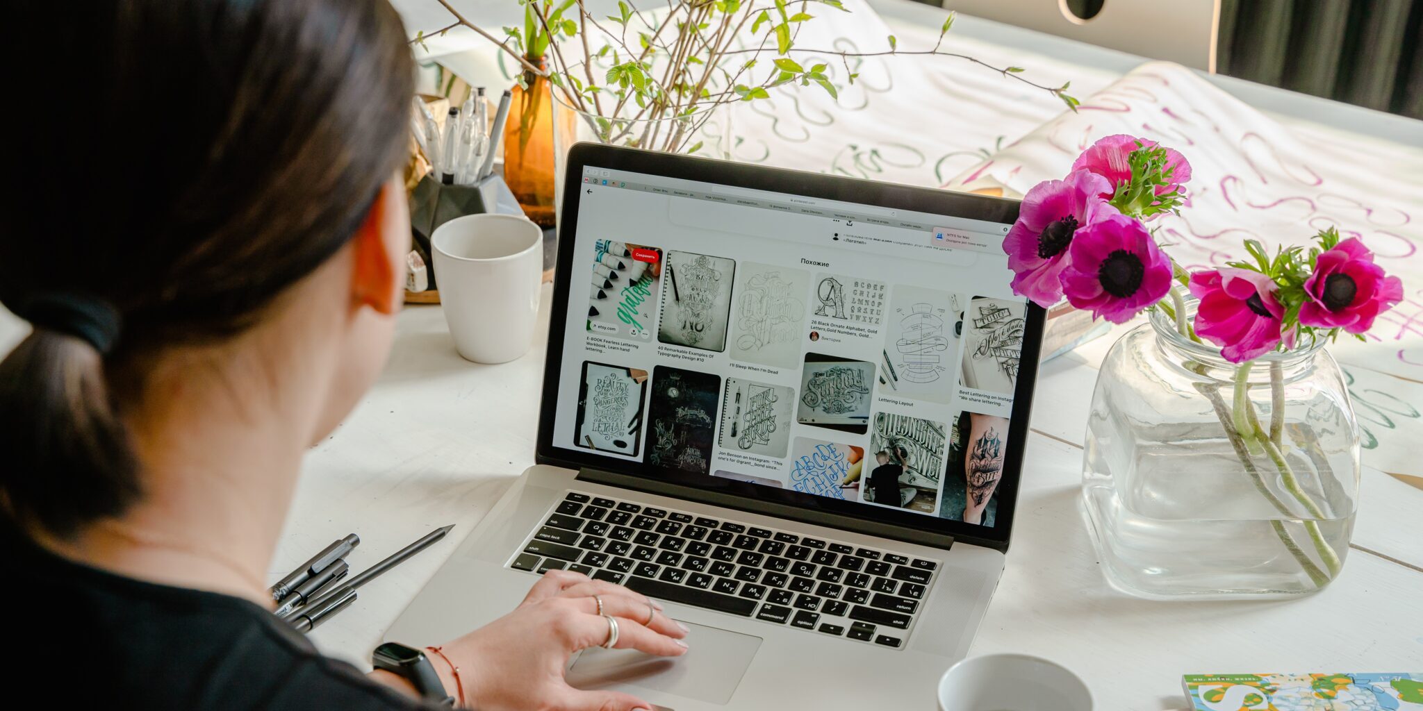 Woman working on her laptop.