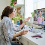 Woman on a video call on her computer.